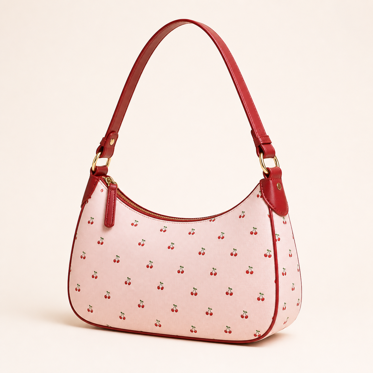 Pink shoulder bag with a cherry print